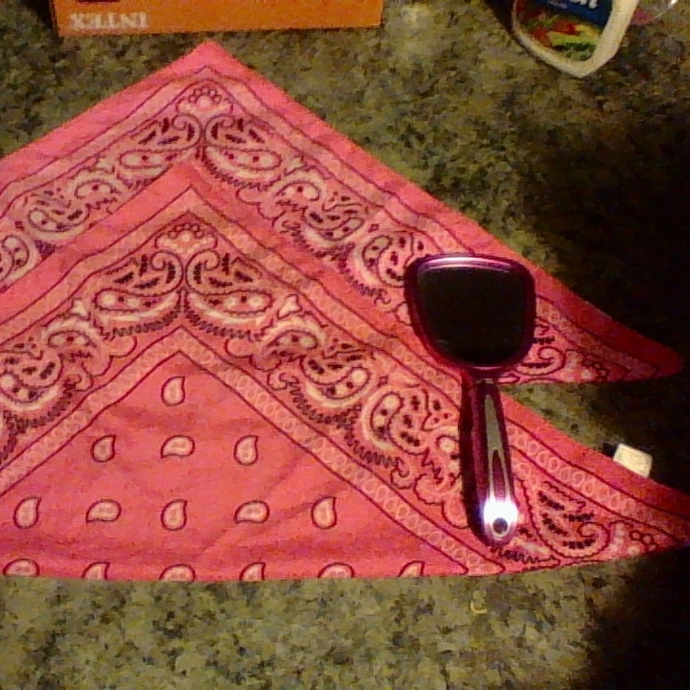 two bandannas, And a pink mirror